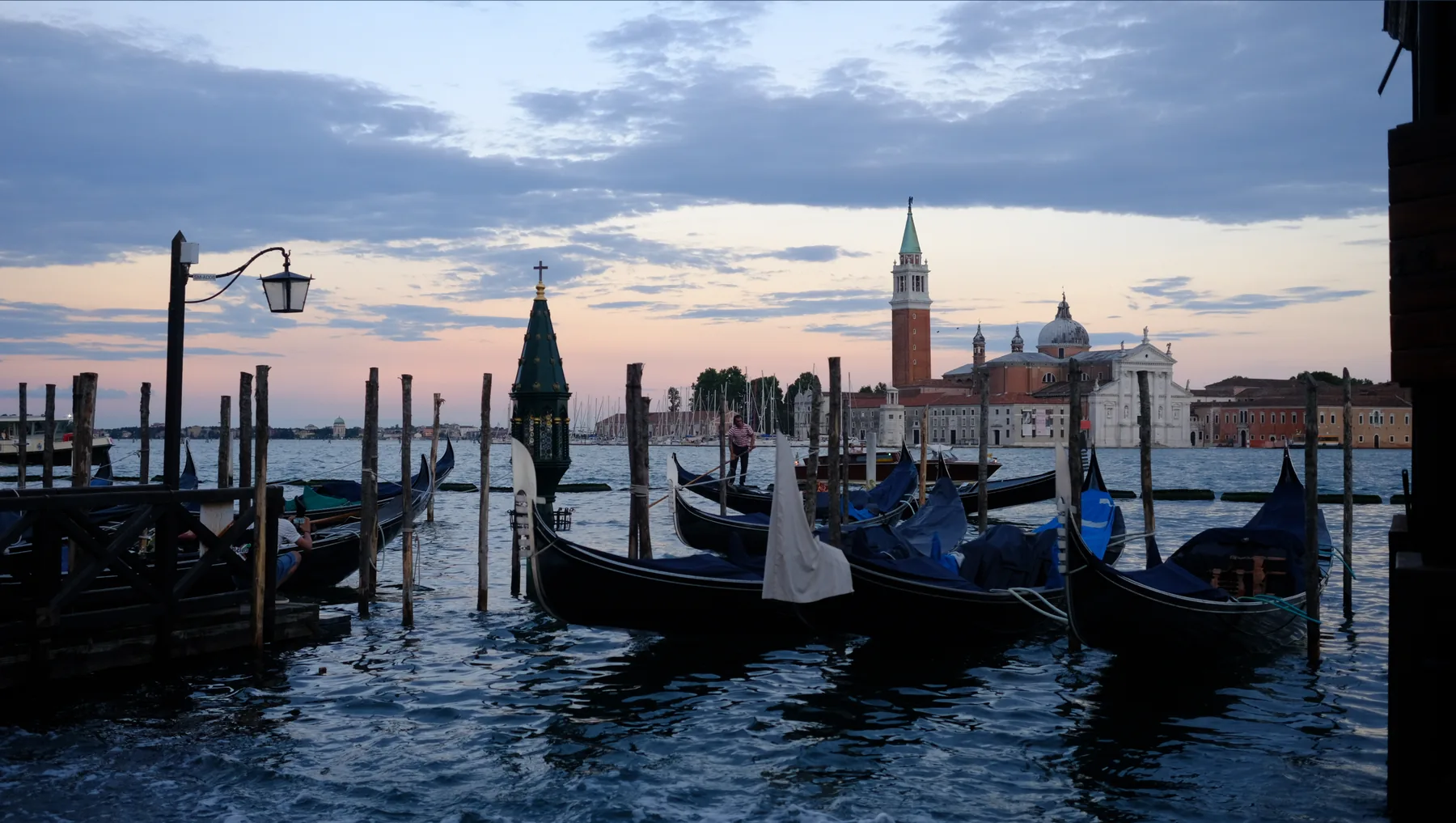 Gondolas overlooking San Giorgio Maggiore across the Venice lagoon